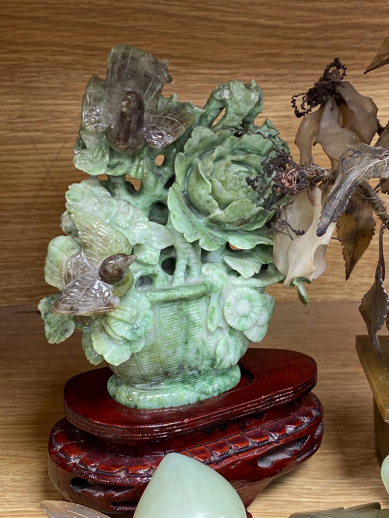 A group of hardstone grapes and floral displays and jadeite carvings